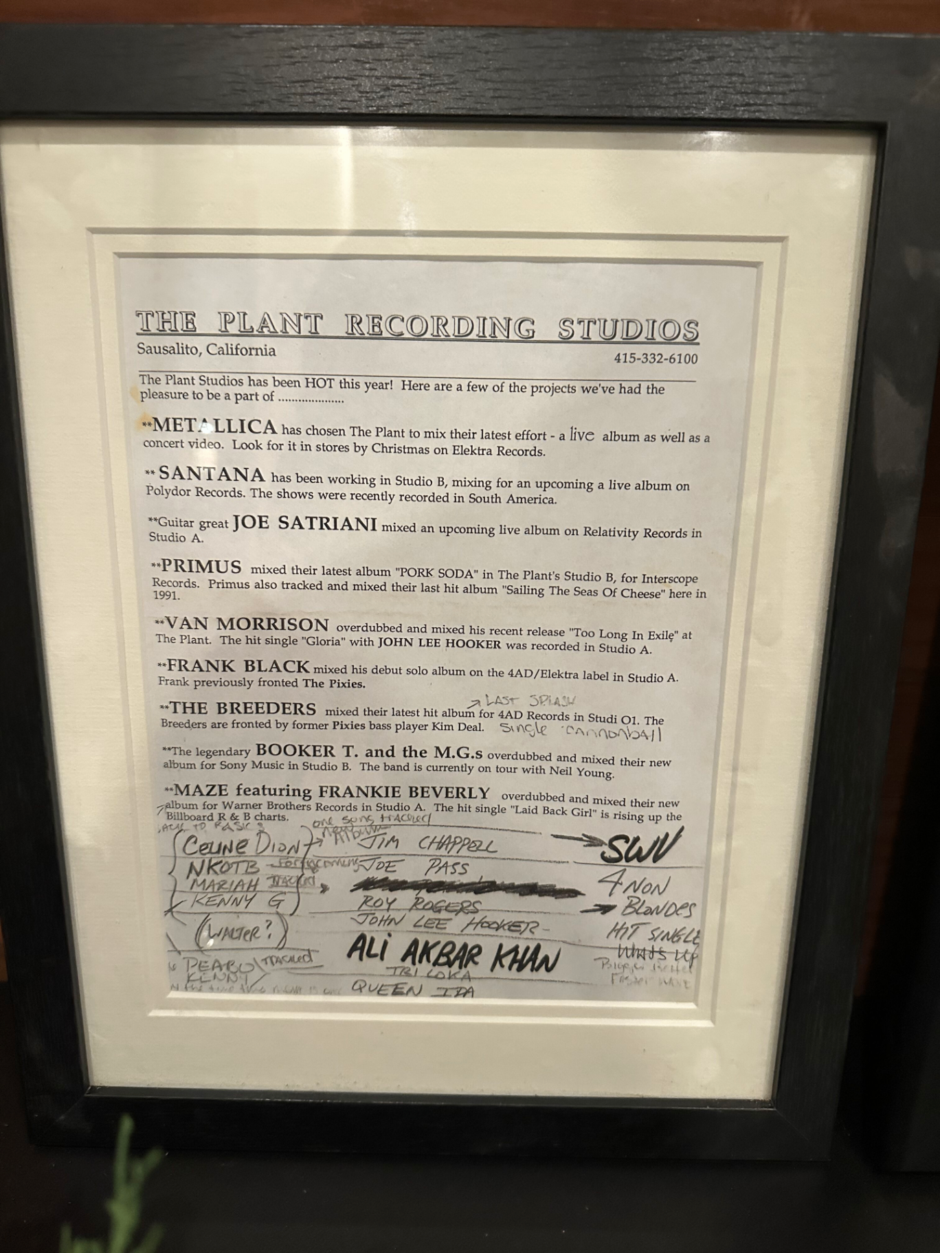 Framed 1993 Plant Recording Studios client list with typed entries (Metallica, Santana, Joe Satriani, Primus, Van Morrison, Frank Black, The Breeders, Booker T. and the M.G.s, Maze) and handwritten additions (Celine Dion, NKOTB, Mariah, Kenny G, Jim Chappell, Joe Pass, Roy Rogers, John Lee Hooker, Ali Akbar Khan, SWV, 4 Non Blondes).