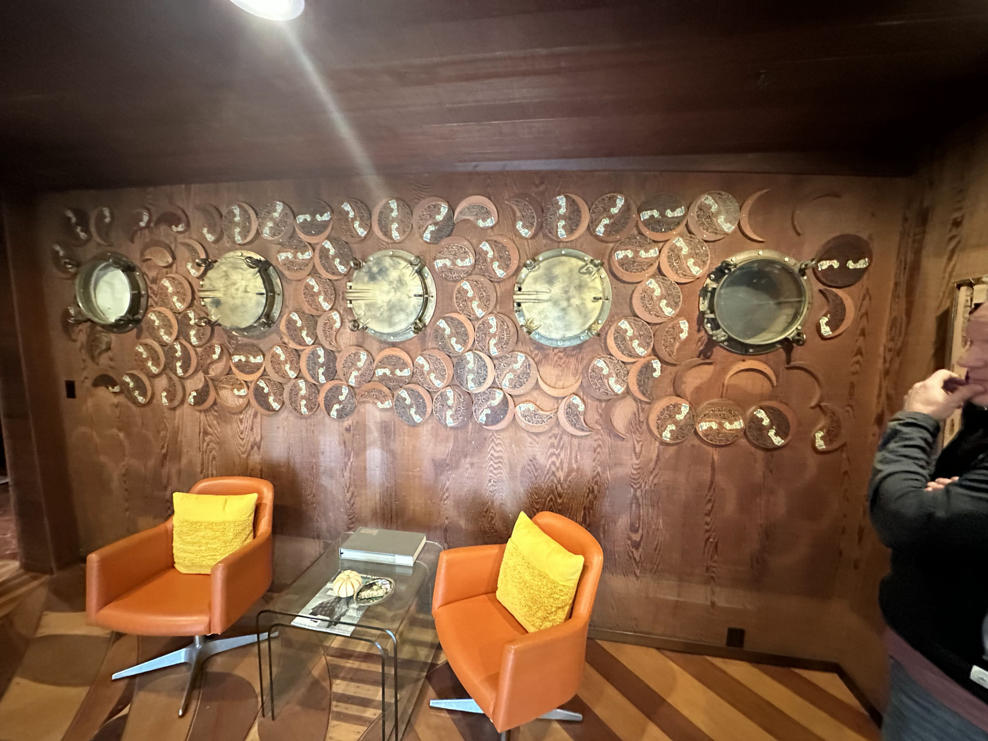 Wall of carved redwood opening-party invitations in the Record Plant Sausalito lobby.