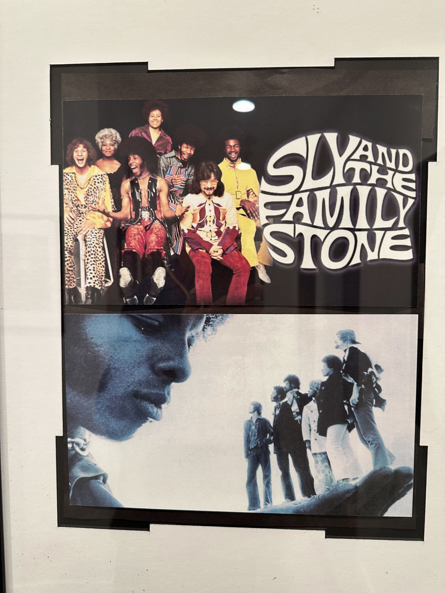 Framed Sly and the Family Stone band poster on the wall at 2200 Studios